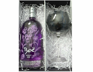 70cl bottle of Boe Violet Gin with an Ice and a Slice branded balloon glass, nestled in white shred and presented in a black gift box. 